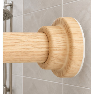 This decorative wood shower curtain tension rod adjusts from 31-88 in and uses a heavy-duty 1.1" stainless steel spring structure; the no-drill, non-slip design installs easily in bathrooms and windows with a farmhouse style.