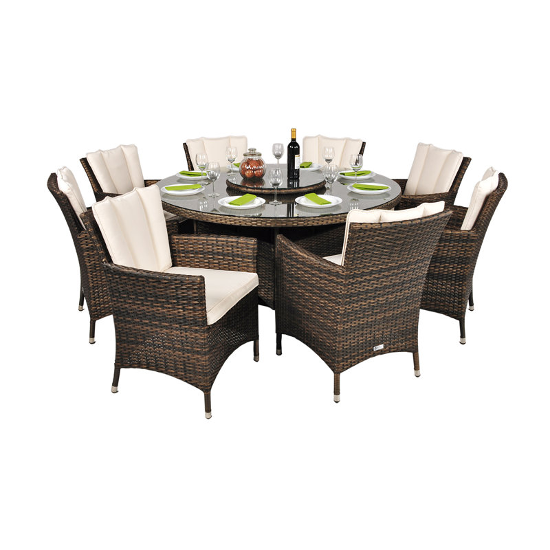 Harold 8 - Person Patio Dining Set Umbrella Hole Included Round Table with Cushions Included