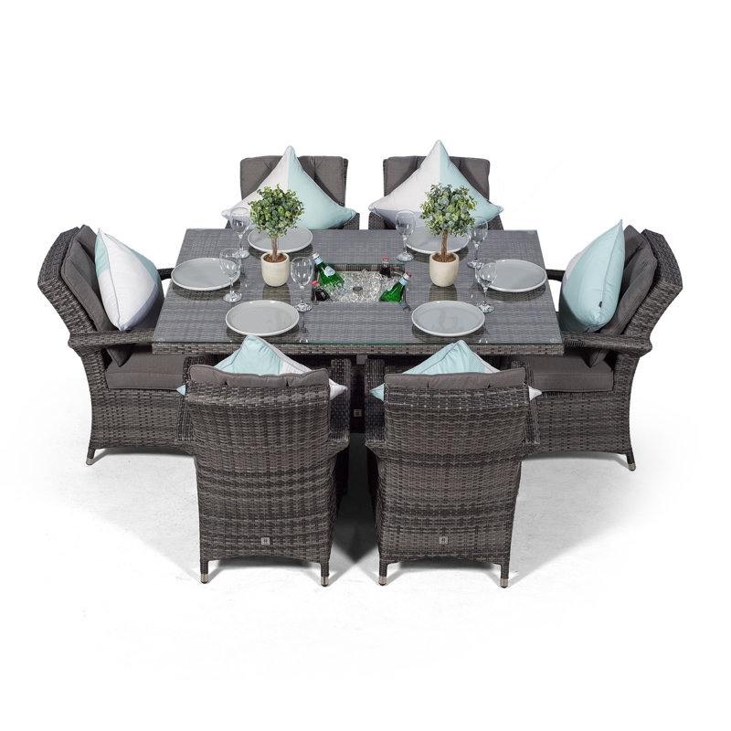 Karas 6 - Person Wicker Patio Dining Set with Rectangular Table , Cushions Included, Grey