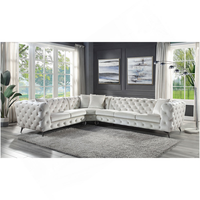 Canapé modulaire en tissu beige avec 4 coussins Atronia
