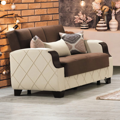 Convertible avec rangement en brun foncé. Idéal pour les petits espaces. Fabriqué en Turquie. Siège ferme. 39,48 de large. Taille 47,2 po x 47,2 po. Nettoyer les taches dans les dortoirs recommandés. Coussins de siège de qualité. 600 lb