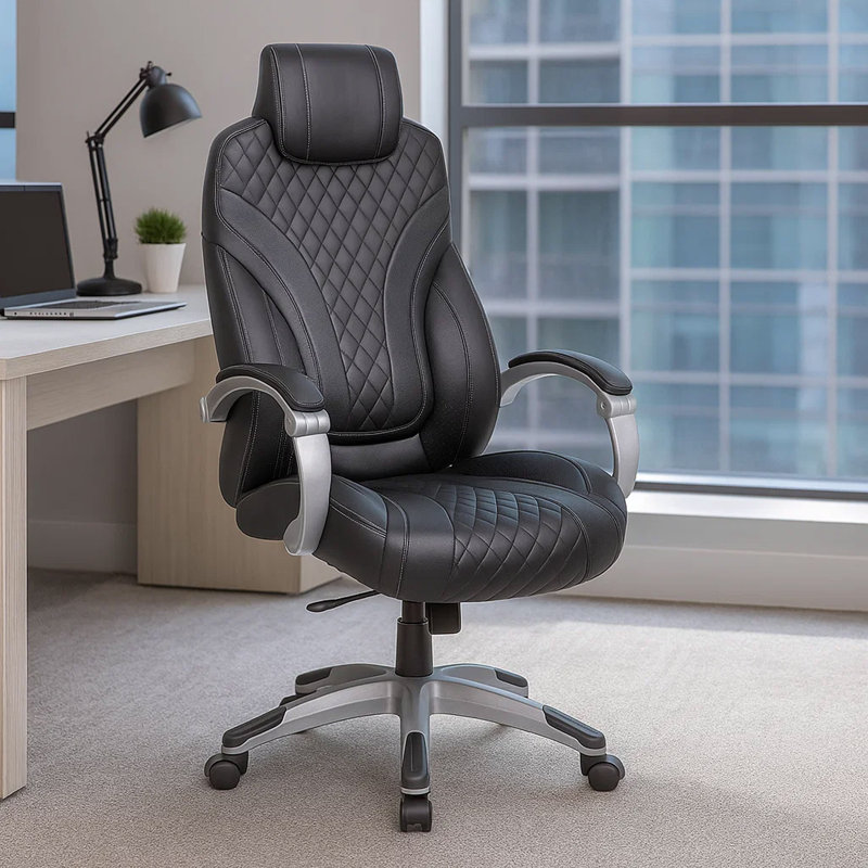 Fauteuil de direction Kelly à dossier cousu noir Caressoftplus, Caressoft Vinyle plus noir