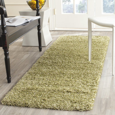 Assar Green Area Rug