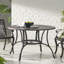 Table de mobilier d'extérieur en aluminium coulé bronze avec motif repas dans une riche décoration complexe