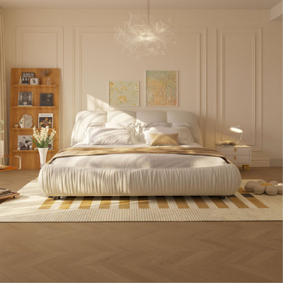 Grand lit plateforme tapissier de luxe avec dossier surdimensionné et structure en bois massif, convenant à plusieurs hauteurs de matelas