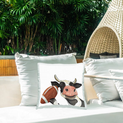 Coussin d'extérieur imprimé «Cow with Football» par Sharon Kuplack