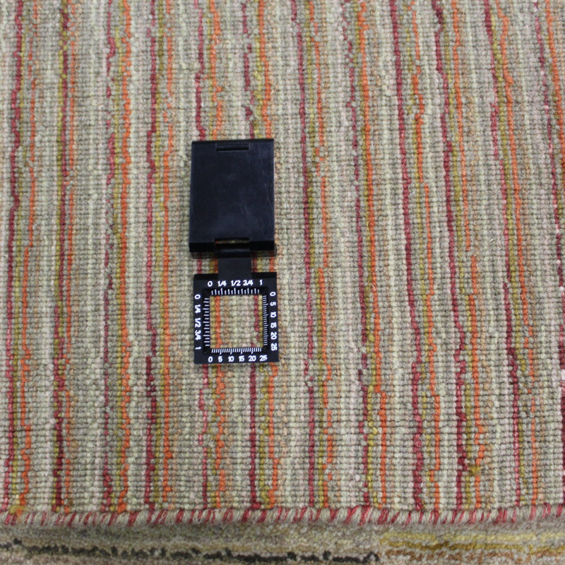 Wasif Area Rug in Brown