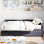 Lit simple tapissier en forme de L avec velours gris et rangement. Tête de lit confortable. Tiroirs spacieux pour les vêtements. Armoire latérale supplémentaire