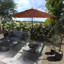 Parasol de patio en bronze 11 pieds avec nervures en fibre de verre et collier inclinable en oléfine terre cuite-303157381