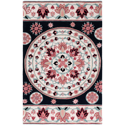 Dajsha Hand Tufted Wool Floral Rug