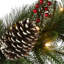 The Holiday Aisle® 9 ft. Bristle Berry Pine Garland with Battery Operated LED Lights