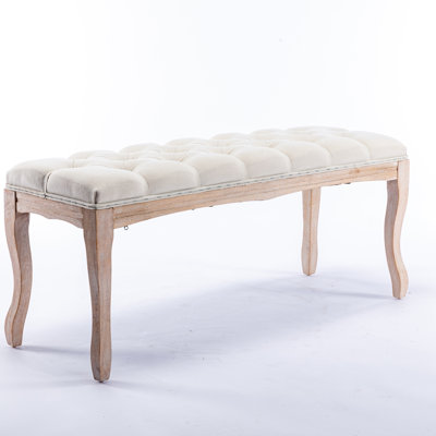 Upholstered Tufted Bench with Distressed Wood Legs