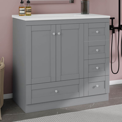 Meuble-lavabo sur pieds 36 po avec lavabo en céramique, 4 tiroirs à fermeture en douceur et 2 portes à fermeture en douceur