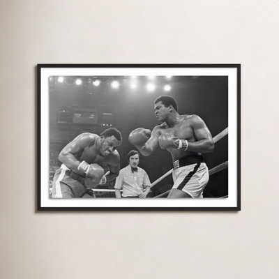 Adom "Muhammad Ali Punching Joe Frazier" Print