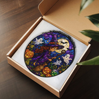 Sorcière avec balais en verre coloré pour fenêtre