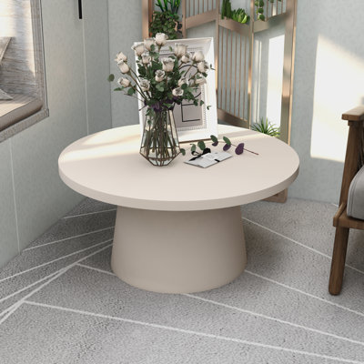 Table basse ronde en fibre de pierre avec piédestal Ladislava
