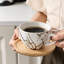 Tasse à café en céramique / porcelaine-98973365