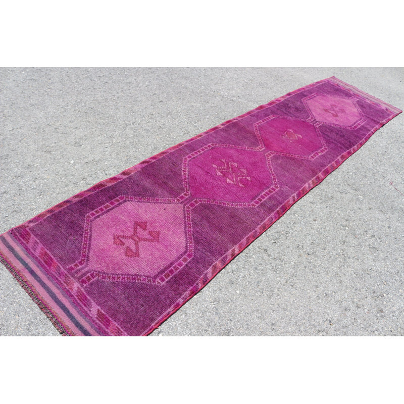 Tapis turc exquis rose pour rehausser l'élégance et le charme de votre salon ou de votre couloir