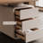 Cream-colored solid wood desk with a simple design