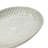 Debossed Stoneware Plate In White Reactive Glaze
