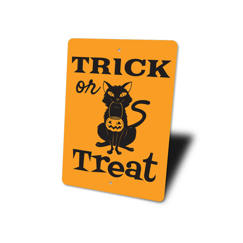 Enseigne «Trick or régal», H 18 po x l 12 po x P 0,06 po