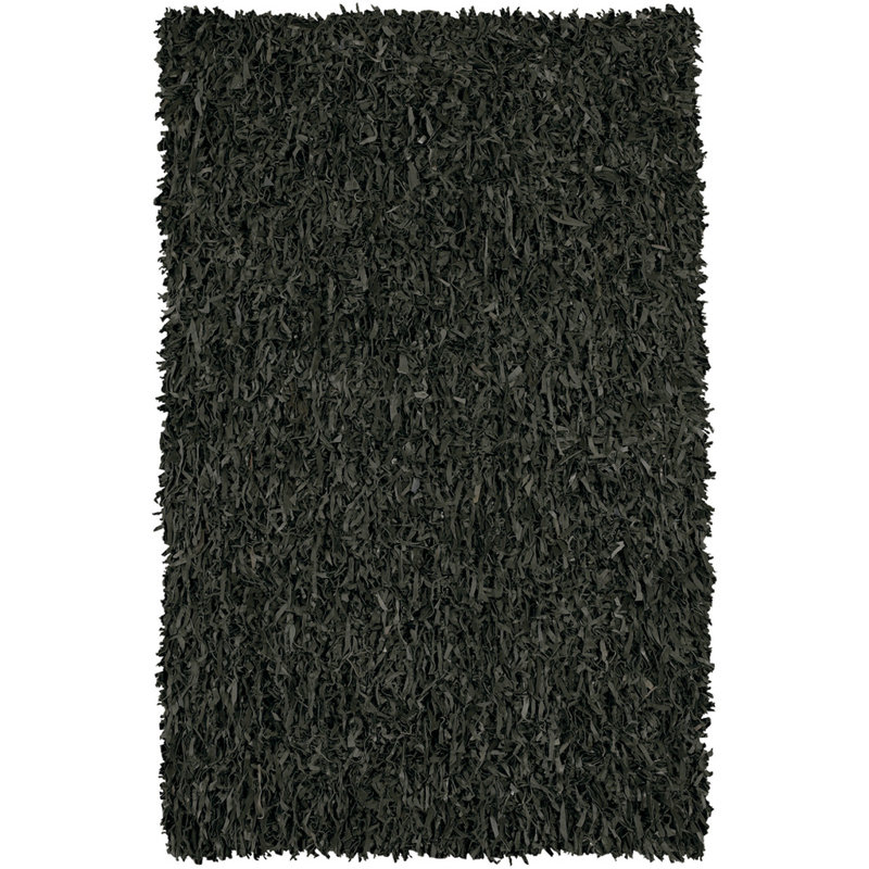 Tapis d'intérieur rond en cuir noir tissé à la main Jawawn, Rond 4 pi 9 po