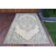 Authentique tapis turc tissé à la main dans une palette de couleurs vibrantes, parfait pour rehausser le décor de votre salon
