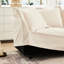 Fauteuil avec housse en chenille. Siège profond en crème. Grand coussin pour coussins de soutien. Détente luxueuse