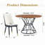 Ensemble de table et de chaises. Une table de salle à manger circulaire en panneau de fibres à densité moyenne de 47,3 po de diamètre, avec des supports en forme de sablier. Elle est assortie de 4 chaises en polyuréthane.
