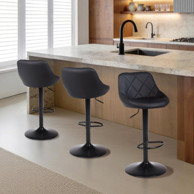 Illyas Swivel Upholstered Adjustable Height Counter Stool with Metal Frame