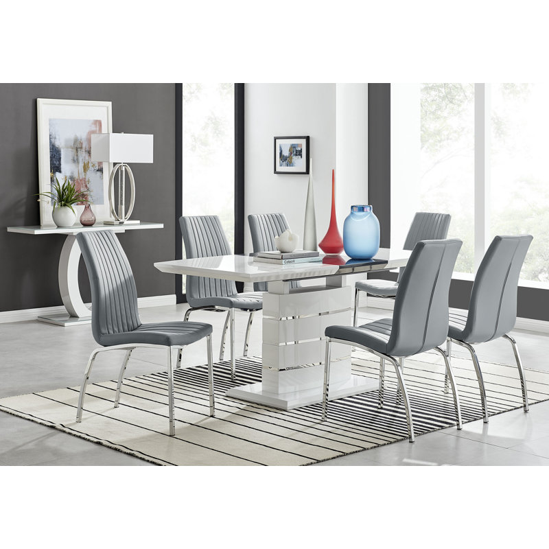 Ensemble de salle à manger extensible haute brillance Everson avec 6 chaises de salle à manger rembourrées en similicuir