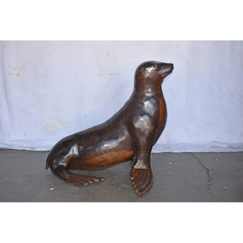 Perched Life Size Seal bronze statue - Size: 40"L x 35"W x 31"H.