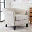 Fauteuil demi-tonneau rembourré à rayures
