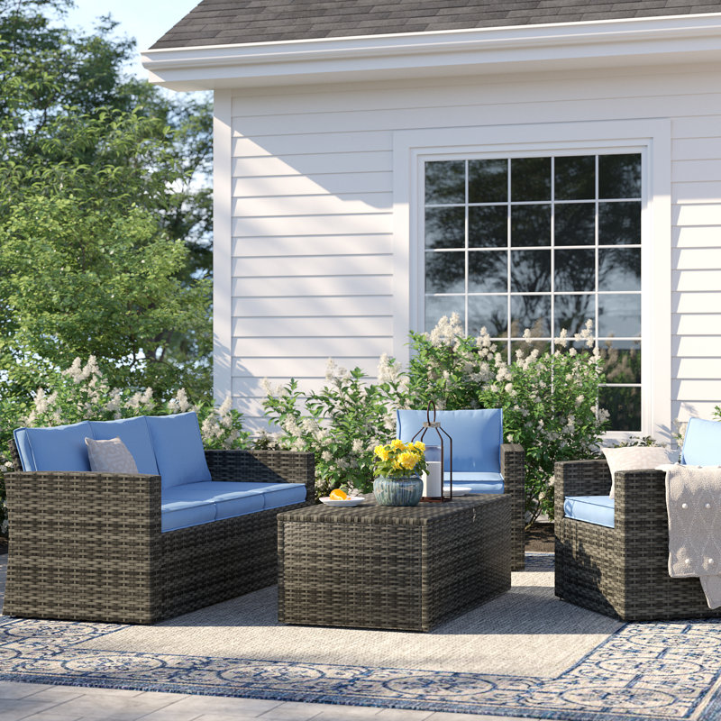 Arlington 5-Person 4-Piece PE Wicker Patio Conversation Set with Cushions and Storage Table, Blue
