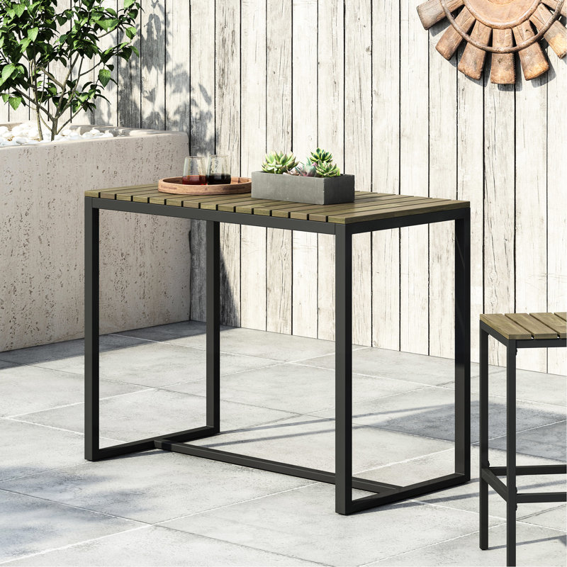 Table de bar gracieuse en bois avec structure en métal noir pour le patio