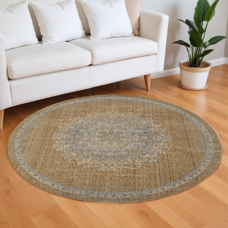 Tapis rond vieilli 9 pi