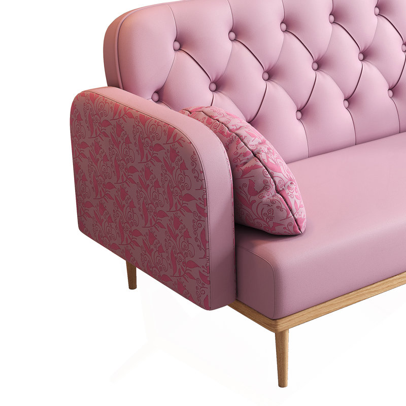 Charmant canapé à motif de tulipes avec coussins en tissu d'ameublement doux pour une expérience d'assise élégante et confortable.