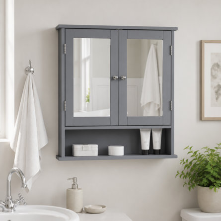 Grey wall-mounted bathroom cabinet with two mirrored doors and an open storage shelf below, installed above a bathroom vanity.