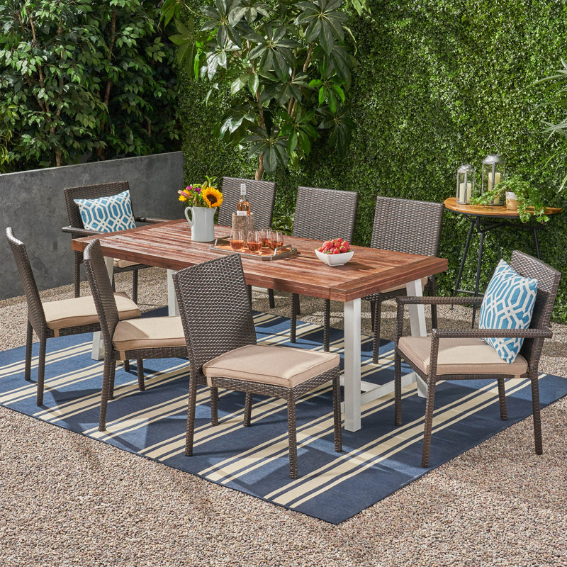 Kulpsville 79'' Rectangular 8 - Person Outdoor Dining Set with Cushions, Multibrown Frame / Beige Cushion