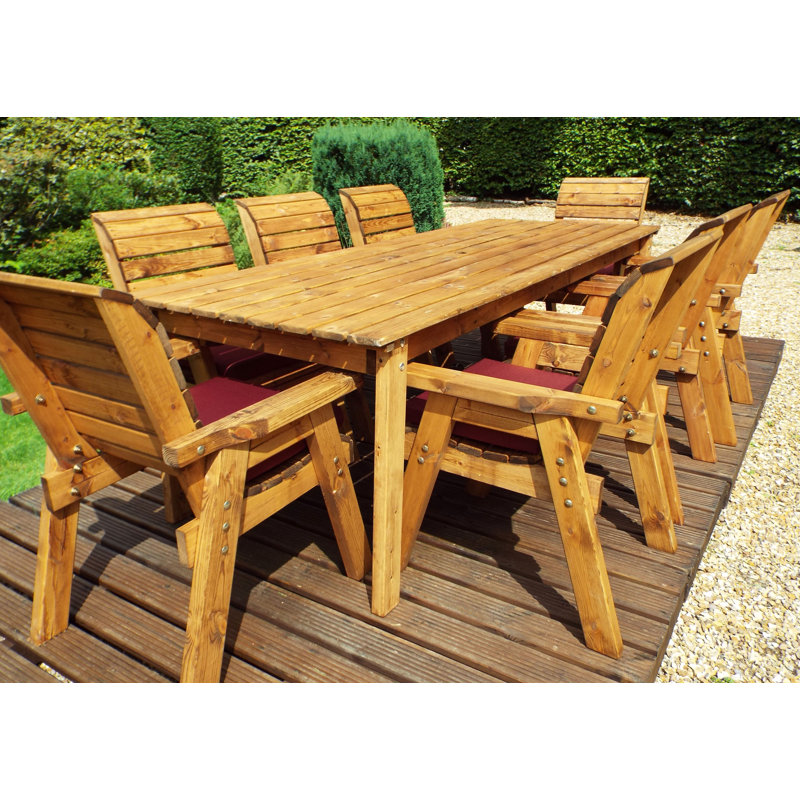 Finney 8 - Person Wood Patio Dining Set with Rectangular Table , Cushions Included, Burgundy