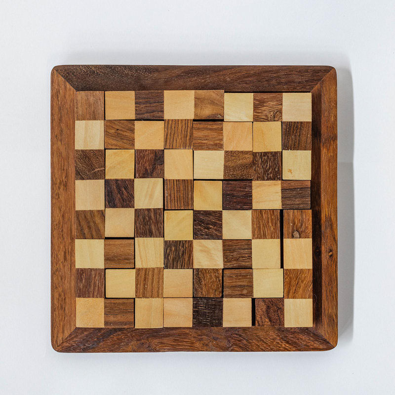 Light, Medium And Dark Brown Cubes In A Wooden Frame Checker Board Game