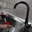 Robinet de cuisine noir moderne avec bec rétractable - fabrication en laiton, poignée simple pour un réglage précis de la température et du débit de l'eau - noir contemporain, levier fonctionnel
