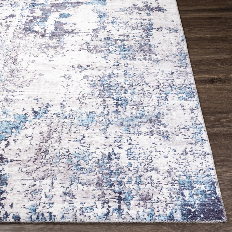 Tapis bleu / ivoire tissé à la machine, Rectangle 2 pi 3 po x 3 pi 9 po