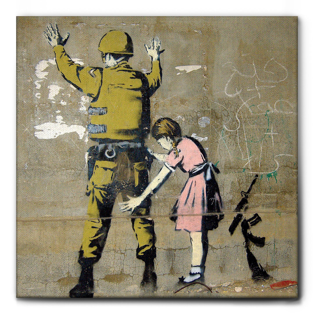 Leinwandbild Girl Frisks Soldier von Banksy