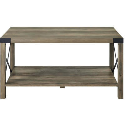 Table basse à finition rustique avec plateau en particules et support en métal rectangulaire Profondeur des pieds de l'ensemble