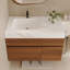 Meuble-lavabo flottant moderne avec plateau en pierre frittée sans soudure et lavabo en céramique