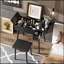 Meuble-lavabo noir 27,9 po avec miroir rabattable, lumière DEL, station de charge, 2 tiroirs et panneau rabattable, comprend un tabouret rembourré pour la chambre à coucher