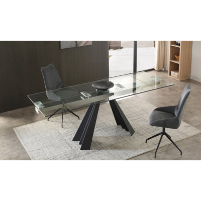 Daryla 63" Clear And Black Glass And Metal Drop Leaf Pedestal Base Dining Table by Orren Ellis