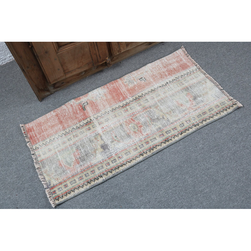 Vintage Turkish Mat Featuring Soft Pastel Colors and Geometric Patterns Ideal for Entryway Decor