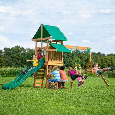 Backyard Discovery Belmont Cedar Wood Swing Set with Wave Slide, Play Deck, Rock Wall Ladder, and Snack Bar Window